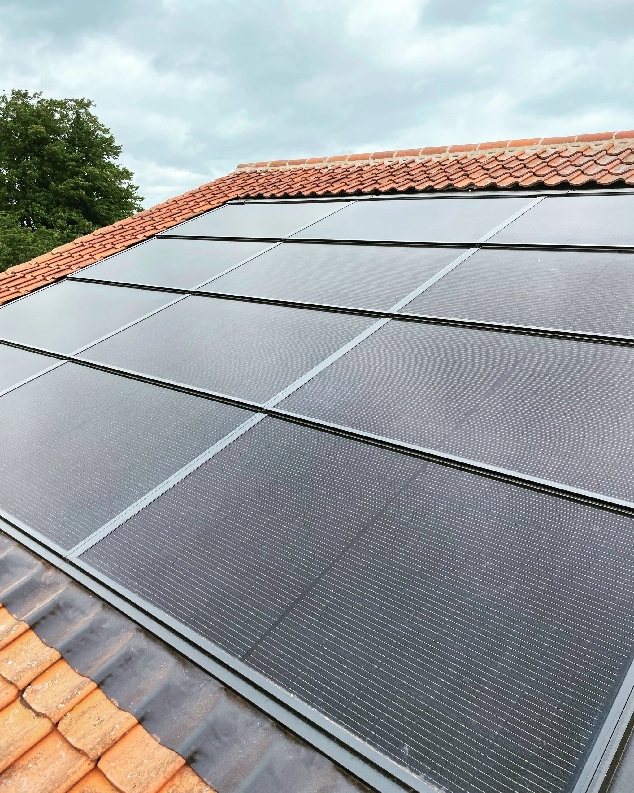Solar panels on terracotta roof tiles